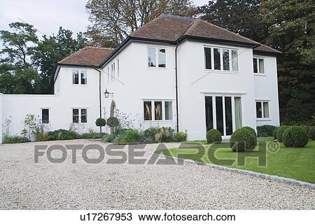 House exterior with surrounding yard and driveway View Large Photo Image Stock Image - House exterior with surrounding yard and driveway. Fotosearch