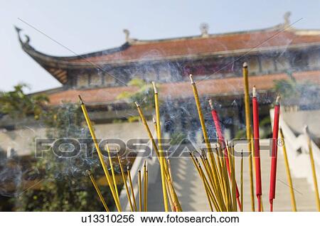 Incense Sticks Burning Outside of Temple View Large Photo Image Stock Photograph - Incense Sticks Burning Outside of Temple. Fotosearch
