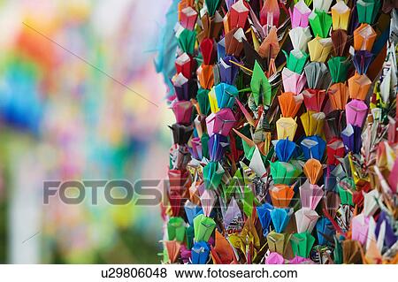 Japan Hiroshima Peace Memorial Park colorful paper cranes close-up View Large Photo Image Stock Photo - Japan Hiroshima Peace Memorial Park colorful paper cranes close-up. Fotosearch