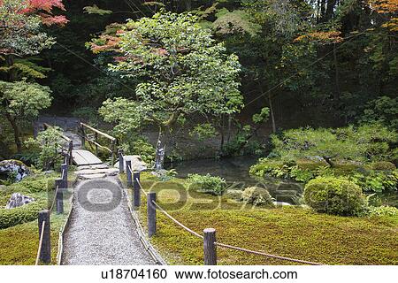 Stock Image - Japan Kyoto Tenju-an Temple garden with footpath and bridge. Fotosearch