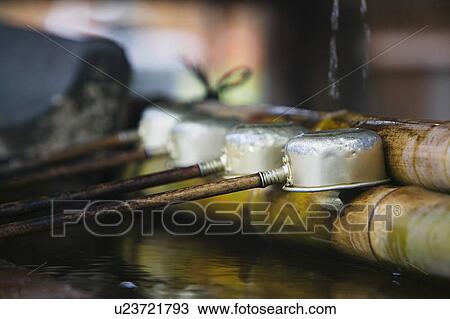 Stock Image - Japan Nara Kofuku-ji Temple Row of ladles close-up. Fotosearch