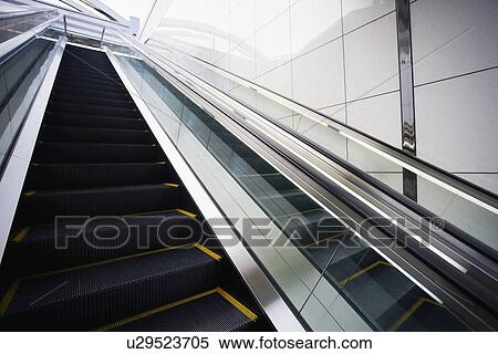 Japan Osaka JR Station man on top of escalator View Large Photo Image Stock Photography - Japan Osaka JR Station man on top of escalator. Fotosearch