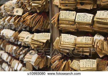 Japan Tokyo Meiji-jingu Shinto Shrine Small wooden plaques with prayers and wishes (Ema) View Large Photo Image Stock Image - Japan Tokyo Meiji-jingu Shinto Shrine Small wooden plaques with prayers and wishes (Ema). Fotosearch