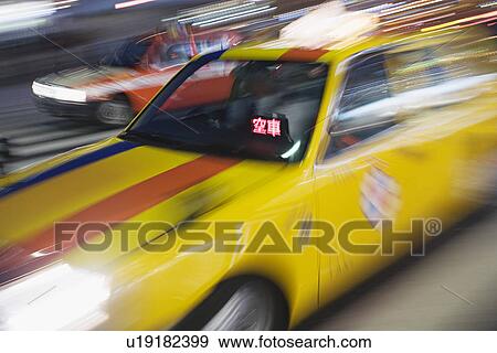 Japan Tokyo street traffic motion blur View Large Photo Image Stock Photo - Japan Tokyo street traffic motion blur. Fotosearch