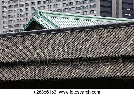 Stock Image - Japan Tokyo Tokyo Imperial Palace Rooftop of Otemon (East Gate) close-up. Fotosearch