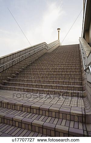 Japan Tokyo Ueno JR Station man on top of steps View Large Photo Image Stock Photo - Japan Tokyo Ueno JR Station man on top of steps. Fotosearch