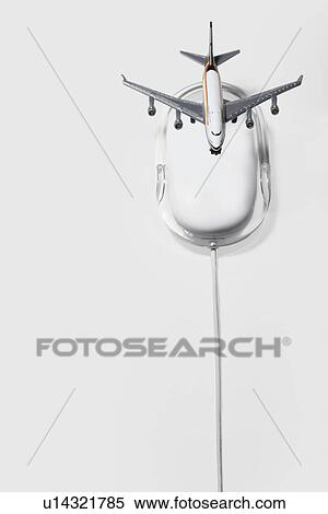 Jumbo jet on apple macintosh computer mouse digital composite View Large Photo Image Stock Photography - Jumbo jet on apple macintosh computer mouse digital composite. Fotosearch