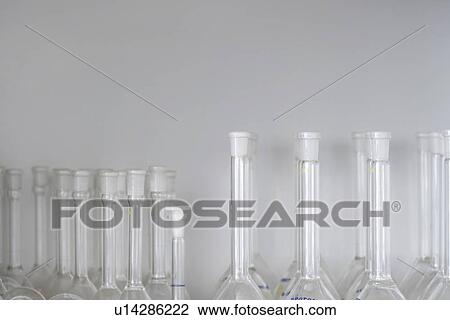 Laboratory flasks on shelf View Large Photo Image Stock Image - Laboratory flasks on shelf. Fotosearch