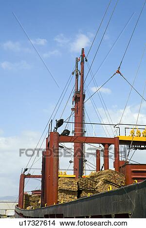 Picture - Limassol Cyprus. Freighter loaded with pine planks. Fotosearch