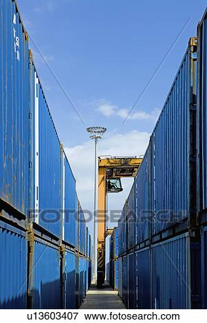 Stock Photo - Limassol Cyprus Mobile crane moving containers in stockyard. Fotosearch