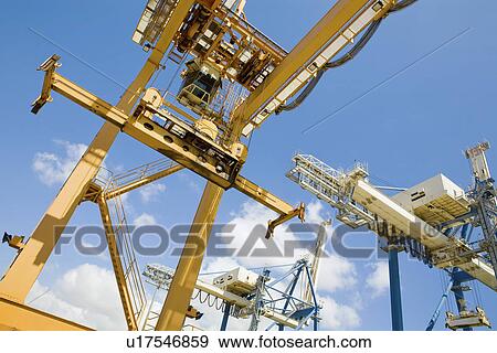 Limassol Cyprus Mobile crane moving containers in stockyard View Large Photo Image Stock Photo - Limassol Cyprus Mobile crane moving containers in stockyard. Fotosearch
