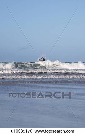 Man surfing waves View Large Photo Image Stock Image - Man surfing waves. Fotosearch
