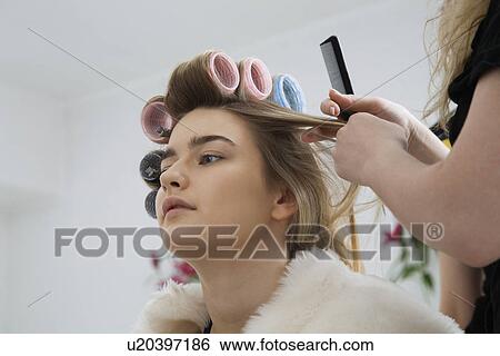 Model Having Hair Put in Curlers View Large Photo Image Stock Photograph - Model Having Hair Put in Curlers. Fotosearch