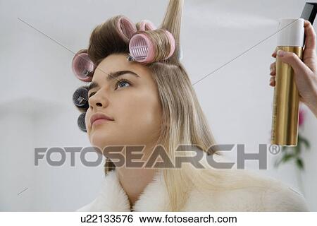 Model Having Hair Put in Curlers View Large Photo Image Stock Photograph - Model Having Hair Put in Curlers. Fotosearch