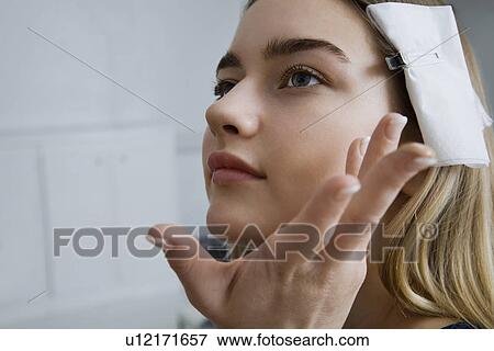 Model Having Makeup Applied View Large Photo Image Stock Photo - Model Having Makeup Applied. Fotosearch