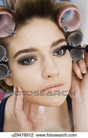 Model in Hair Curlers Having Makeup Applied View Large Photo Image Stock Image - Model in Hair Curlers Having Makeup Applied. Fotosearch