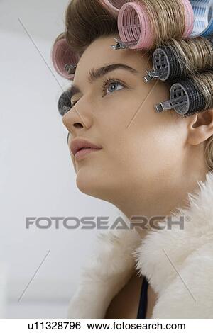 Stock Photograph - Model in Hair Curlers Wearing Fur Coat. Fotosearch