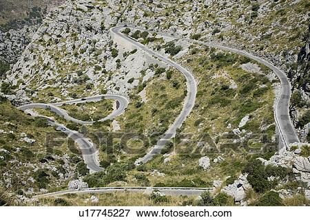 Mountain landscape with winding road View Large Photo Image Stock Photo - Mountain landscape with winding road. Fotosearch