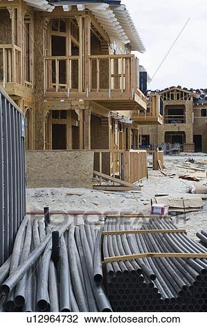 Stock Image - New homes under construction. Fotosearch
