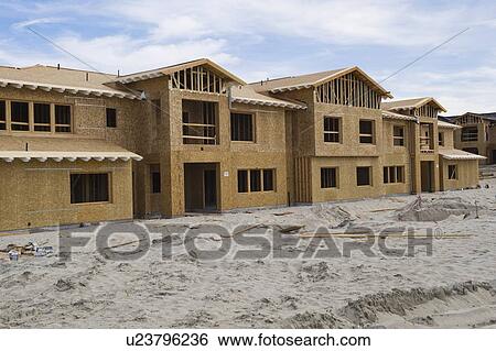 Stock Photograph - New homes under construction. Fotosearch