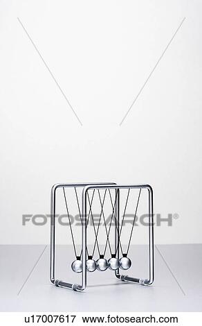 Stock Photo - Newton's cradle. Fotosearch