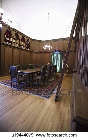 Stock Photo - Old-fashioned home library. Fotosearch