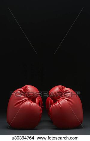 Picture - Pair of red boxing gloves. Fotosearch