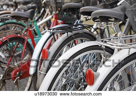 Parked Bicycles View Large Photo Image Stock Image - Parked Bicycles. Fotosearch