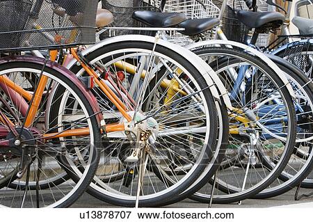 Parked Bicycles View Large Photo Image Stock Photo - Parked Bicycles. Fotosearch