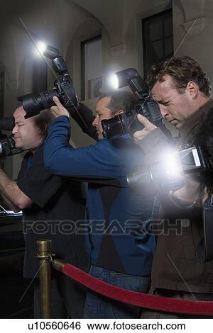 Photographers at media event View Large Photo Image Stock Photograph - Photographers at media event. Fotosearch