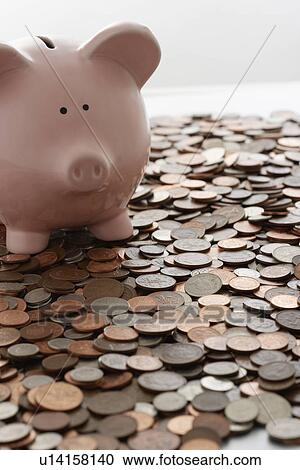 Piggy bank and vast amount of coins View Large Photo Image Stock Image - Piggy bank and vast amount of coins. Fotosearch