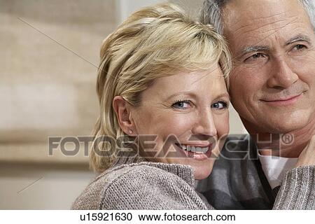 Portrait mature couple hugging close-up View Large Photo Image Stock Image - Portrait mature couple hugging close-up. Fotosearch