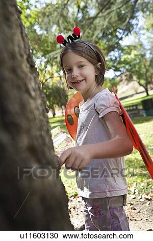Portrait of girl (7-9) in costume View Large Photo Image Stock Image - Portrait of girl (7-9) in costume. Fotosearch