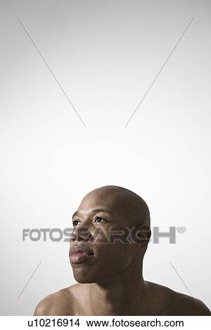 Portrait of young man head and shoulders View Large Photo Image Picture - Portrait of young man head and shoulders. Fotosearch