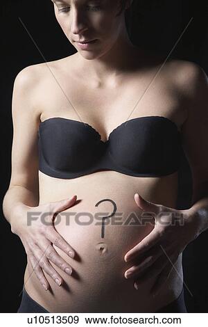 Pregnant woman with question mark on abdomen studio shot View Large Photo Image Stock Photo - Pregnant woman with question mark on abdomen studio shot. Fotosearch