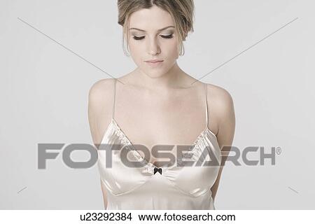 Pretty young woman wearing sexy nightshirt View Large Photo Image Picture - Pretty young woman wearing sexy nightshirt. Fotosearch