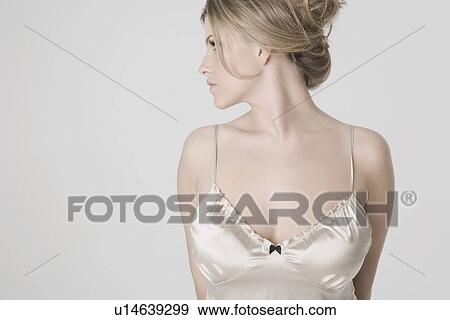 Pretty young woman wearing sexy nightshirt profile View Large Photo Image Stock Photo - Pretty young woman wearing sexy nightshirt profile. Fotosearch
