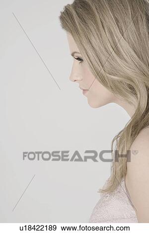 Stock Photo - Profile of sexy young woman. Fotosearch