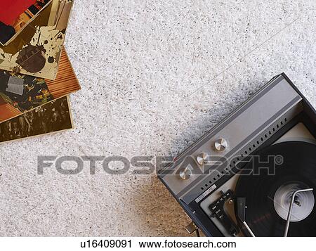 Record player and vinyl records on floor view from above View Large Photo Image Stock Image - Record player and vinyl records on floor view from above. Fotosearch