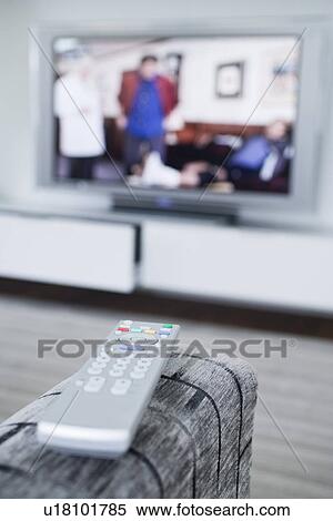 Remote control and television set View Large Photo Image Stock Photography - Remote control and television set. Fotosearch