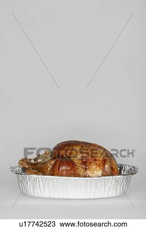 Roasted turkey in tinfoil pan View Large Photo Image Stock Image - Roasted turkey in tinfoil pan. Fotosearch