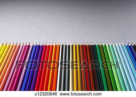 Stock Photograph - Row of multi colored pencils. Fotosearch