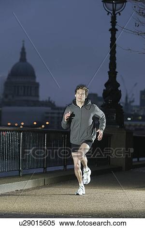 Runner training on early winter morning in London View Large Photo Image Stock Photography - Runner training on early winter morning in London. Fotosearch