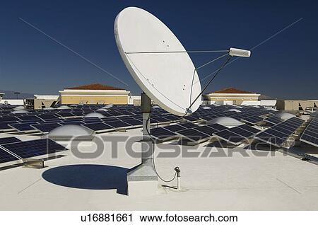 Satellite Dish with Solar Panels at Solar Power Plant View Large Photo Image Stock Image - Satellite Dish with Solar Panels at Solar Power Plant. Fotosearch