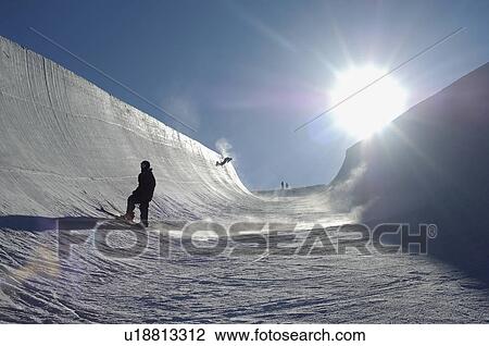 Silhouette of teenage snowboarder on halfpipe View Large Photo Image Stock Image - Silhouette of teenage snowboarder on halfpipe. Fotosearch