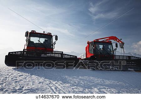 Stock Image - Snow plows in mountains. Fotosearch