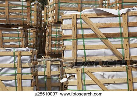 Stacked Crates of Building Materials View Large Photo Image Stock Photo - Stacked Crates of Building Materials. Fotosearch