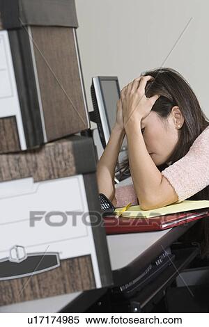 Stressed Asian Businesswoman and Moving Boxes View Large Photo Image Stock Photography - Stressed Asian Businesswoman and Moving Boxes. Fotosearch
