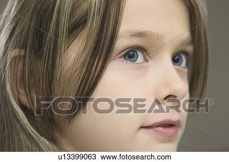 Studio portrait of girl close-up View Large Photo Image Stock Image - Studio portrait of girl close-up. Fotosearch