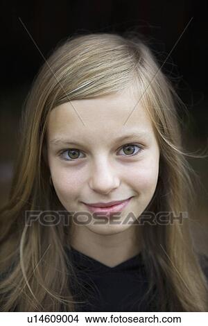 Picture - Studio portrait of girl smiling. Fotosearch